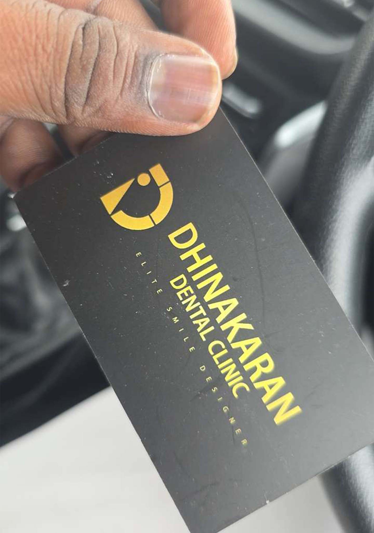 Dhinakaran Dental Clinic contact card