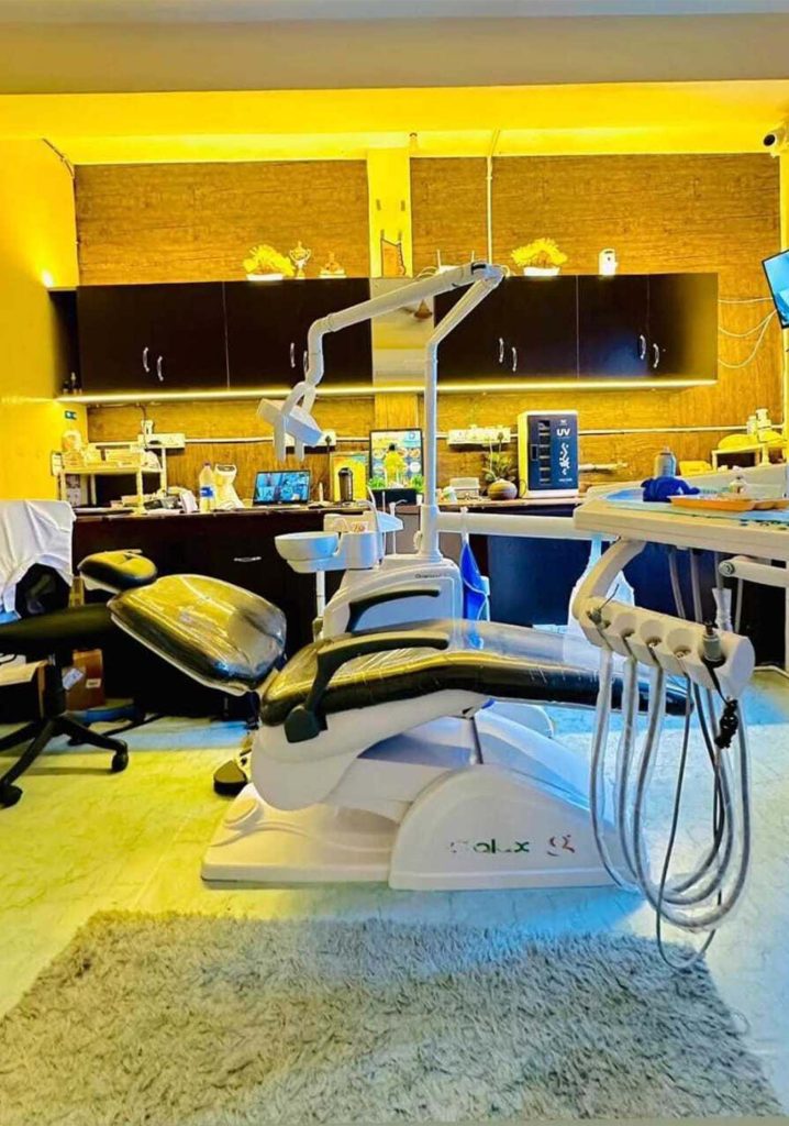 Modern dental clinic interior with chair and equipment